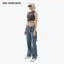 LEATHER PATCH TWISTED STRAIGHT JEANS - BLUE