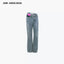 LEATHER PATCH TWISTED STRAIGHT JEANS - BLUE