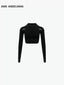 BELT CUT-OUT LONG SLEEVE DECONSTRUCTED KNIT TOP - BLACK